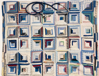 Log cabin quilt in for repair