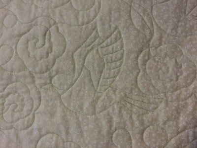 Quilted birds and flowers.