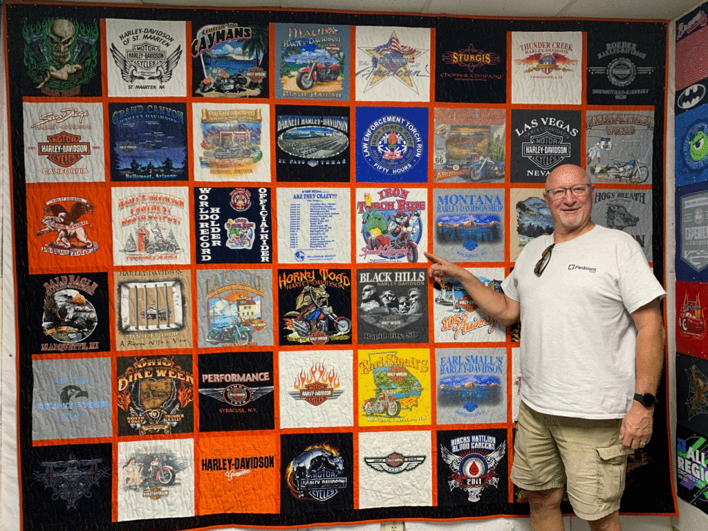 A large Harley motorcycle quilt with shirts from rides for charity and across the country.