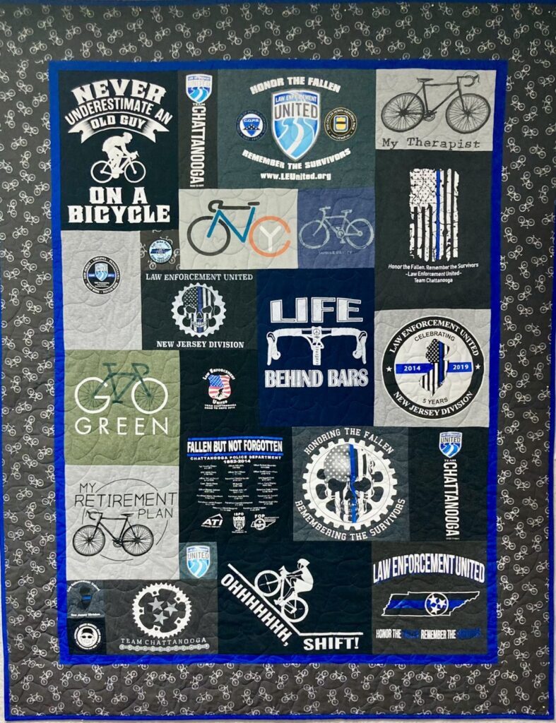 A quilt created in memory of a husband and policeman that enjoyed bike riding.