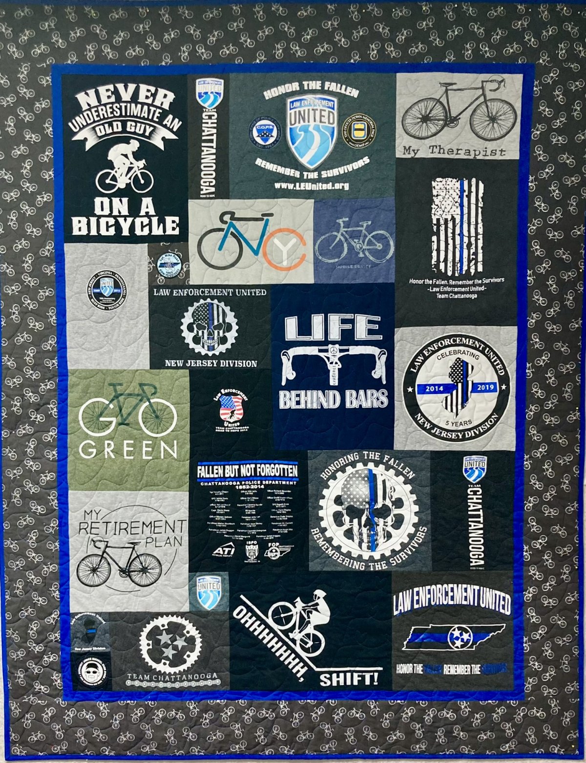 A quilt created in memory of a husband and policeman that enjoyed bike riding.